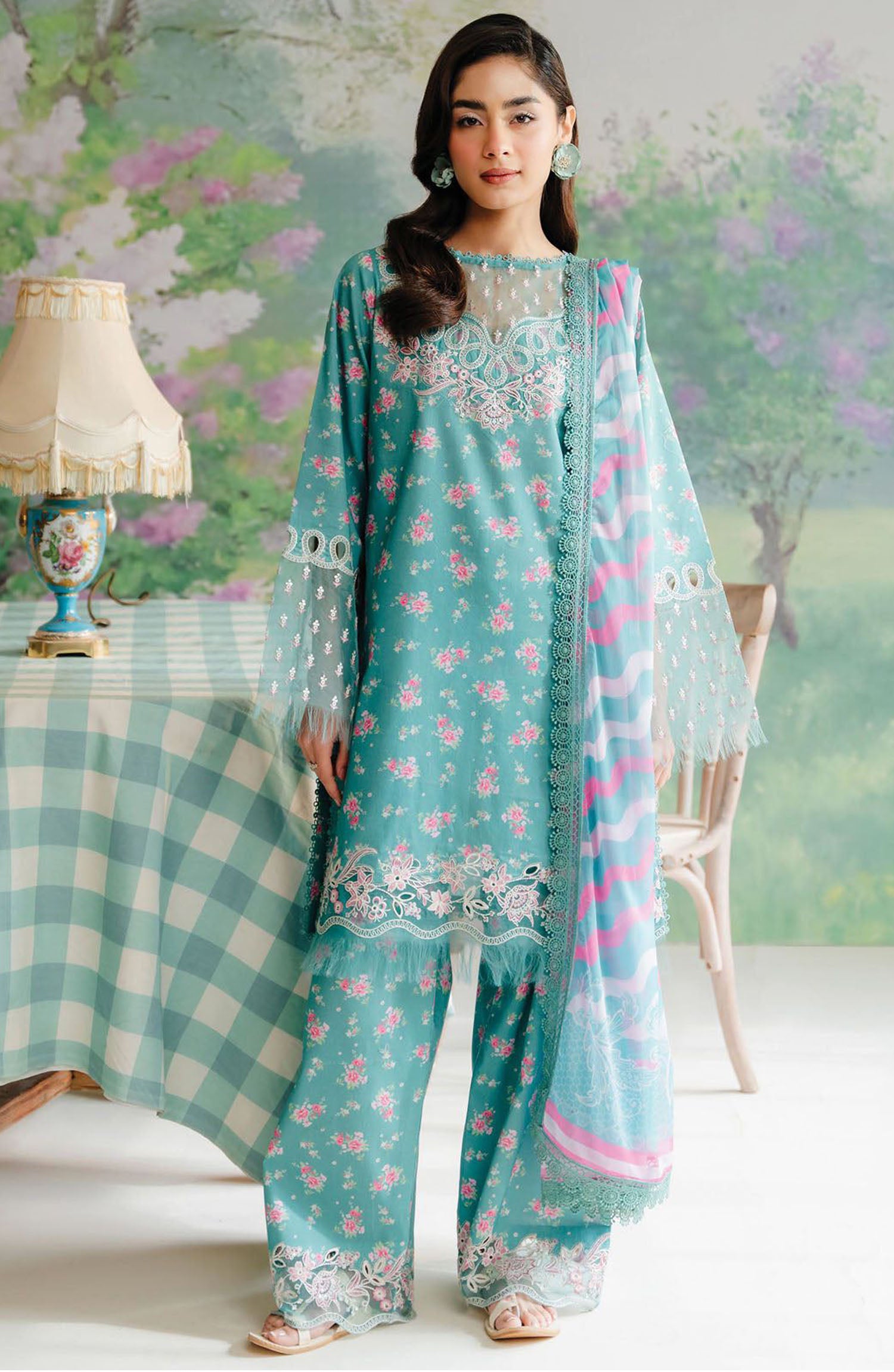 FABRIC LAWN Suit with SILK Dupatta
Neck, Sleeves and Daman Embroidered
Remaining part Digital Printed
with new look and color..