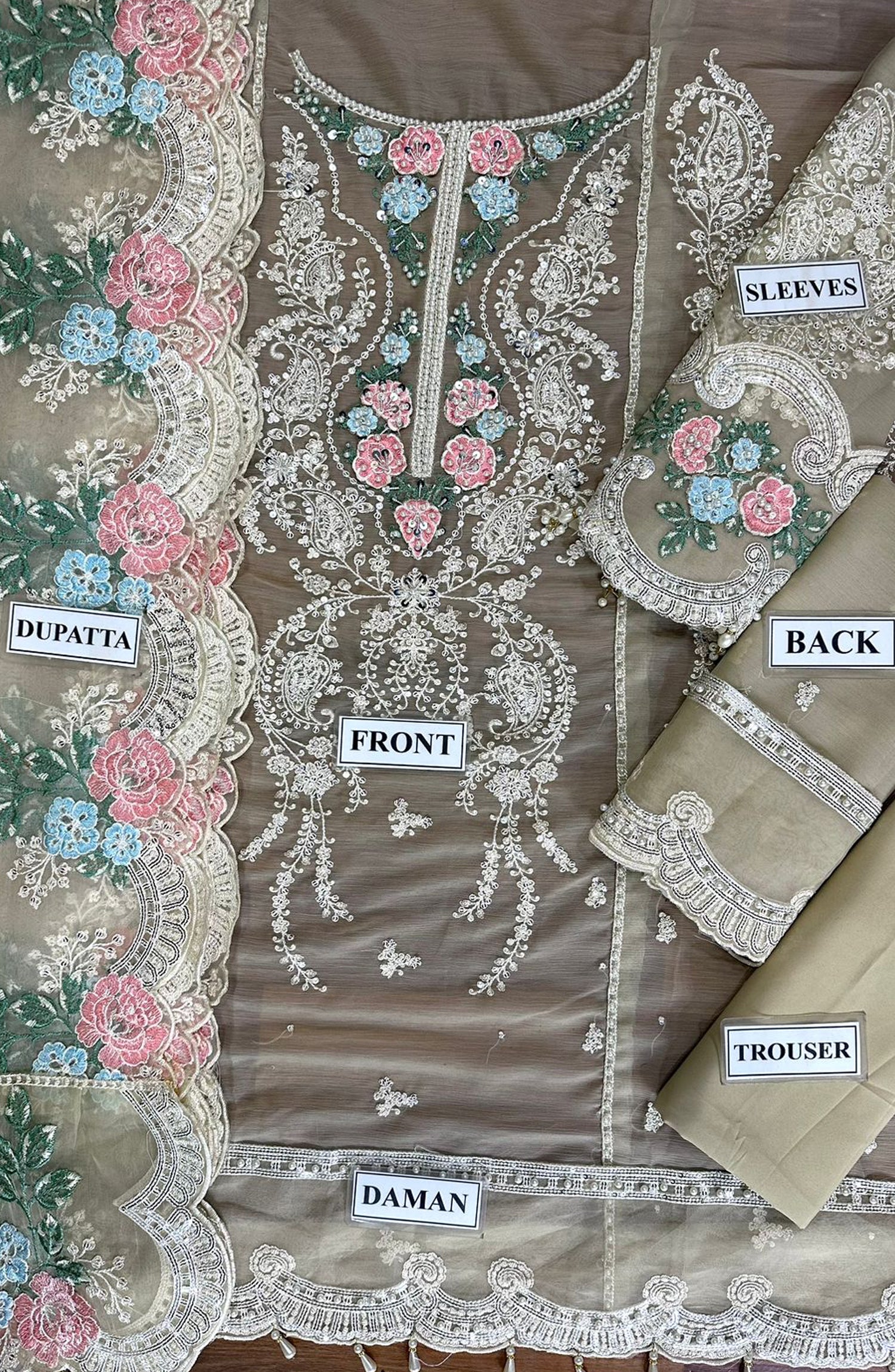 FABRIC Shirt: CHIFFON 10/10 fabric quality Dupatta: ORGANZA 10/10 fabric quality Trouser: MALAI 10/10 fabric quality
WORK Heavily thread & sequence work with heavily embroidered patches 