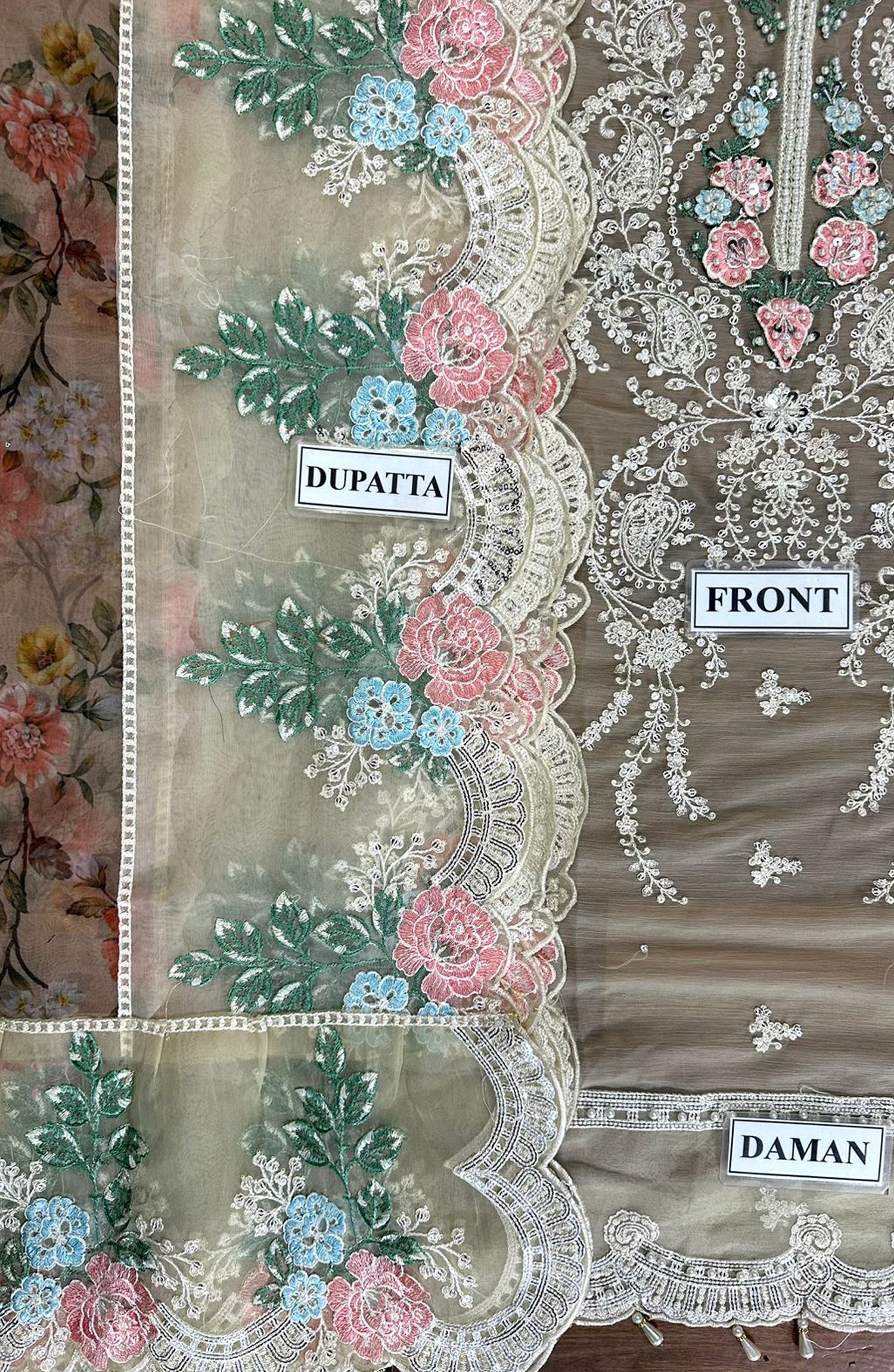 FABRIC Shirt: CHIFFON 10/10 fabric quality Dupatta: ORGANZA 10/10 fabric quality Trouser: MALAI 10/10 fabric quality
WORK Heavily thread & sequence work with heavily embroidered patches 