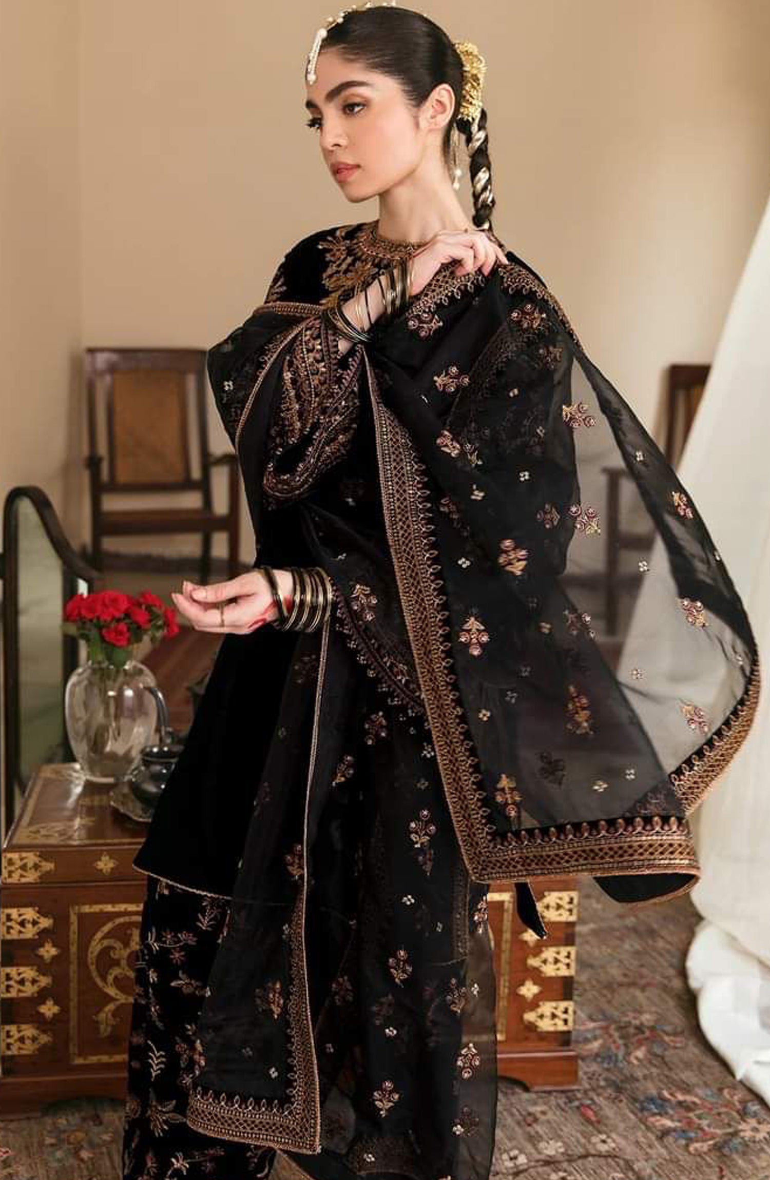 Baroque Jazmin Velvet Wedding Collection an exquisite choice for bridals seeking glamour. This heavy embroidered velvet wedding dress is design from premium Micro 5000 velvet, perfect for your occasion
Fabric Details
• Shirt: Heavy embroidered velvet wedding dress micro 5000
• Duppata: Net Cutwork embroidered dupatta
• Trouser: Dull silk, fully embroidered
Details:
• Heavy embroidered velvet wedding dress micro 5000
• Velvet Embroidered Daman Border
• Velvet Embroidered Sleeves. (fabric for full fall in sle