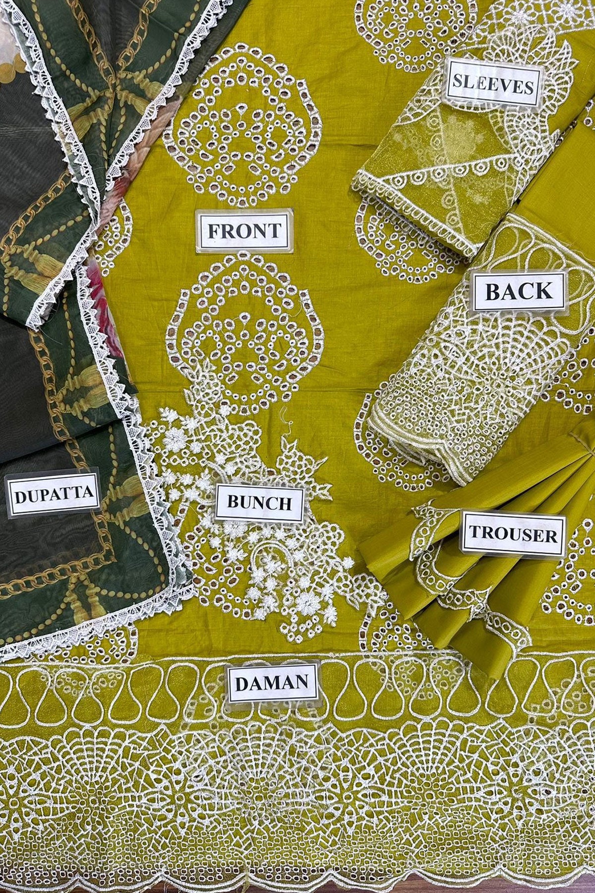 Fabric Details : Cotton & Silk
Chicken Kari Heavy Embroidered Cotton Front.
Embroidered Chicken Kari heavy front.
Chicken karri Embroidered front and back daman 
Heavy Embroidered Cotton chicken Kari Sleeves and border.
Silk digital print dupatta with 4 side lace attach
Ready to wear dupatta
Dyed Cotton Trouser with embroidery patch