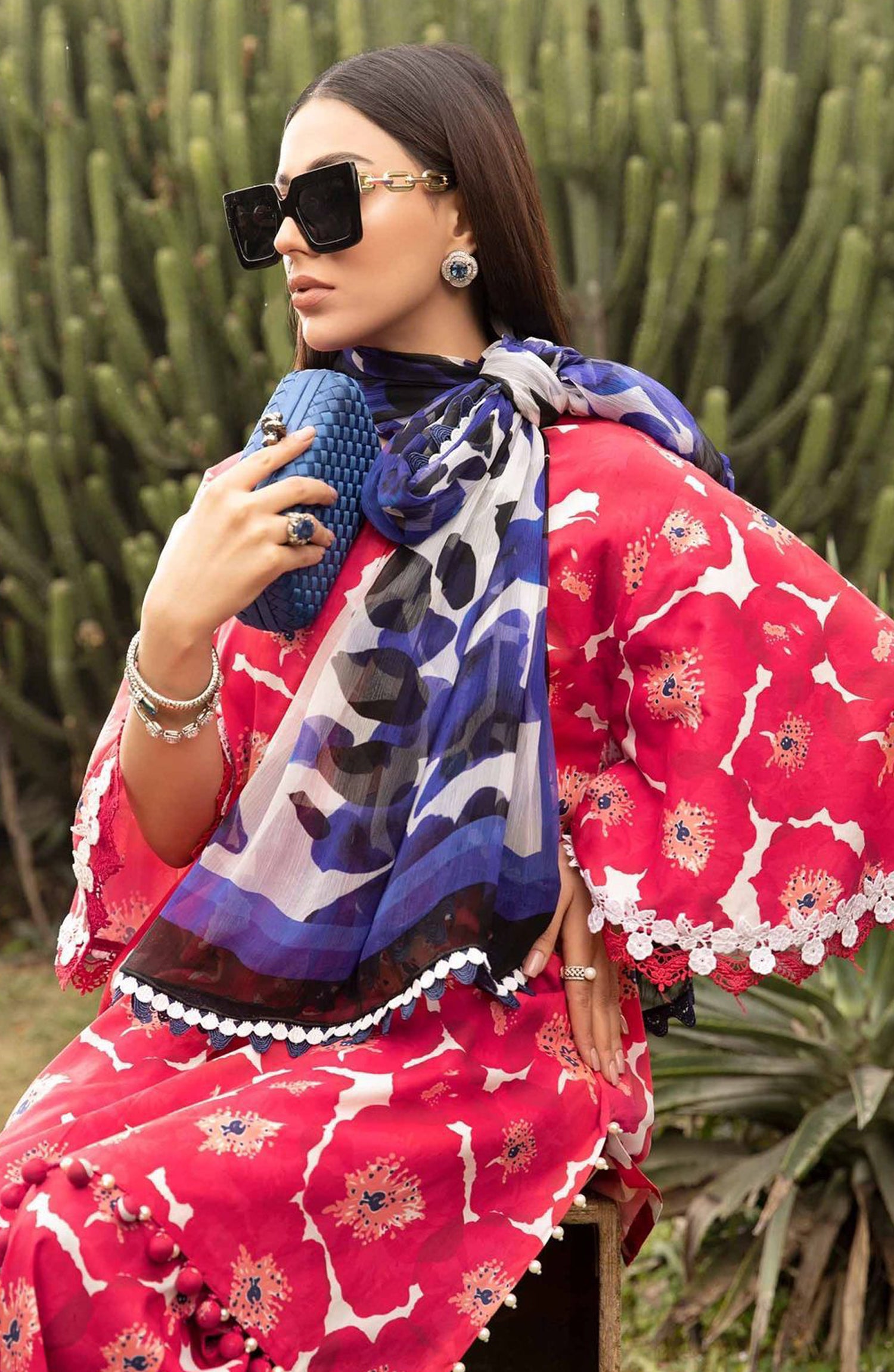 Maria B
Printed lawn front with heavy embroidered spangle work neckline
Printed lawn back
Printed lawn sleeves
Printed chiffon dupatta
printed cambric trouser with embroidered trouser boarder