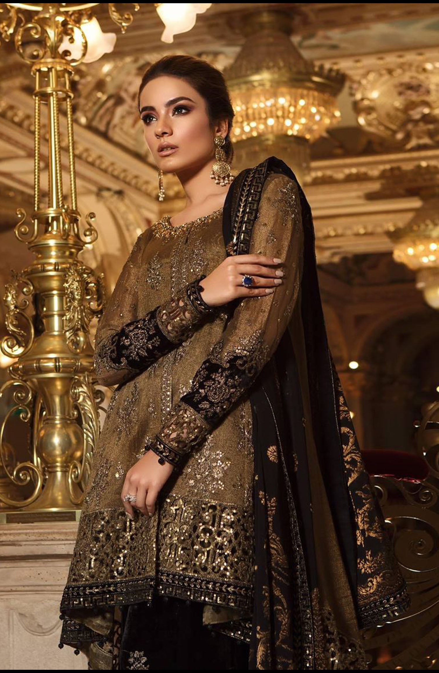 MARIA B Front Organza embroidered with 2 type embroidered daman border with cut work with fully Adah hand work neck 
Back Organza embroidered spangle work with 2 type embroidered spangle Daman border with cut work  Sleeves Organza embroidered  sleeves with 2 type embroidered  border with cut work & 2 embroidered bunches 
Dupatta chiffon heavy embroidered  with 2 side embroidered spangle work pallo on peace with 4 side embroidered lace attach 
Garrara Silk heavy embroidered full length